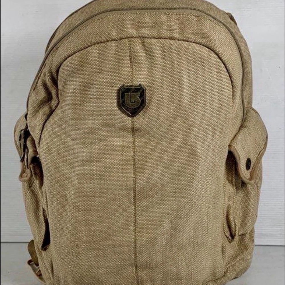 Burton Tan Canvas Backpack with Front Pockets and audio set up